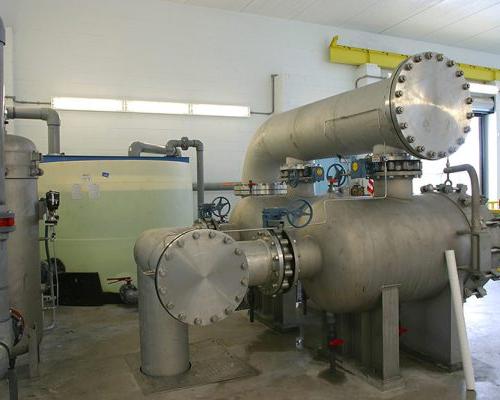 Large pipes inside the facility at the SMRU Water Treatment Facility