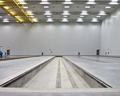 Interior of Spirit AeroSystems Composite Center. Large open room with fluorescent lighting.